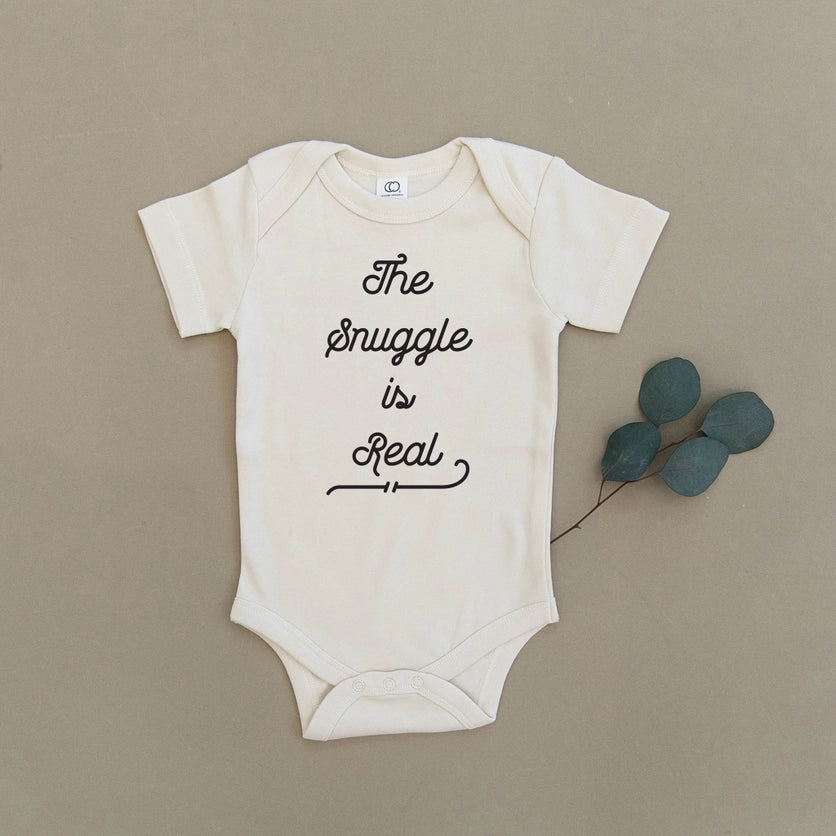 THE SNUGGLE IS REAL ORGANIC ONESIE