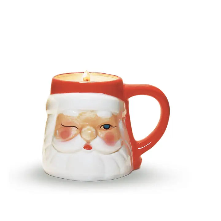 SMALL CERAMIC WINKING SANTA MUG CANDLE
