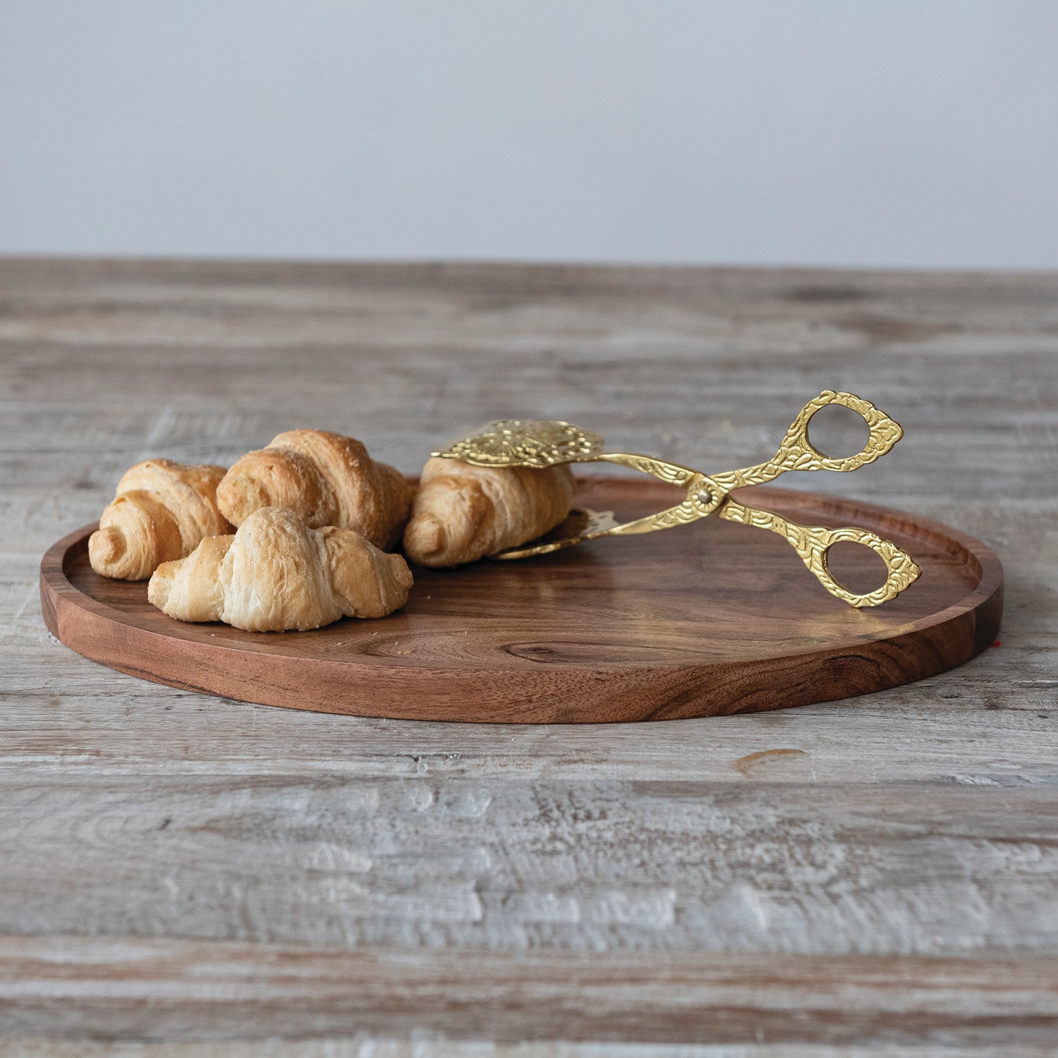 Embossed brass tongs